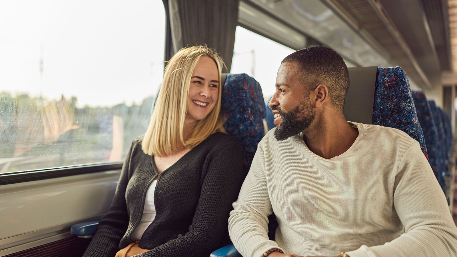 123659-4-NSW-TrainLink-XPT-first-class-on-board-couple-smiling.jpg