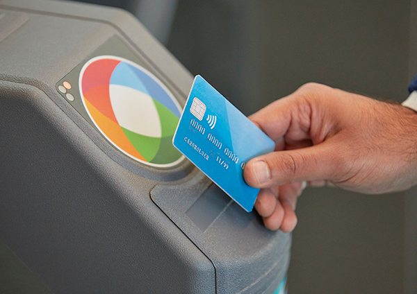 contactless-payment-man-hand-taps-credit-card-on-opal-reader.jpg